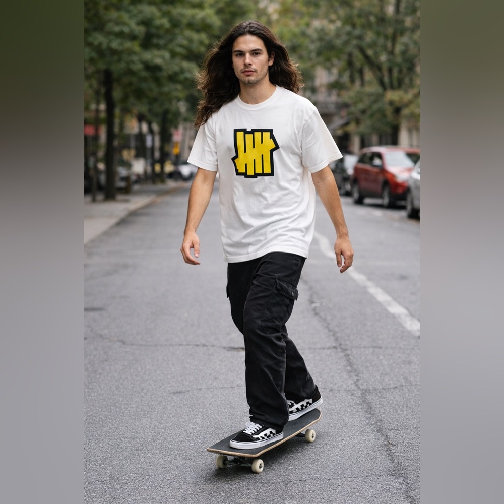 UNDEFEATED DUNK WHITE SHIRT WITH YELLOW GRAPHIC DESIGN SIZE L FINAL $30
